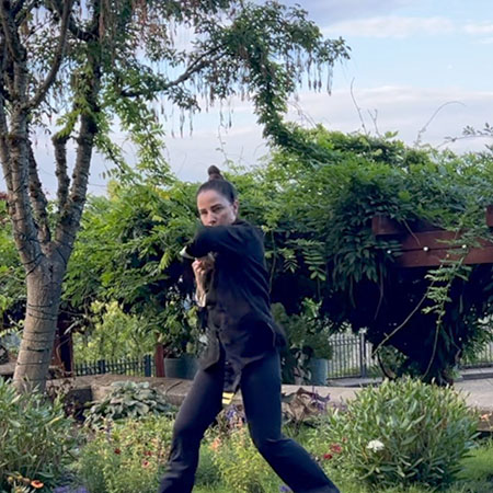 Sifu Kendra practicing Biu Jee form in beautiful location