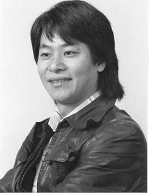 Black and white photo of Grandmaster David Cheung