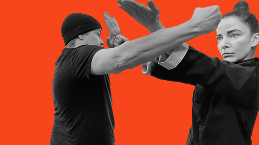 Sifu Kendra Mahon Kung Fu expert demonstrates tan sao punch against a round punch