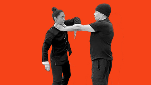 Sifu Kendra Mahon Kung Fu expert demonstrates choke defense using bon sao