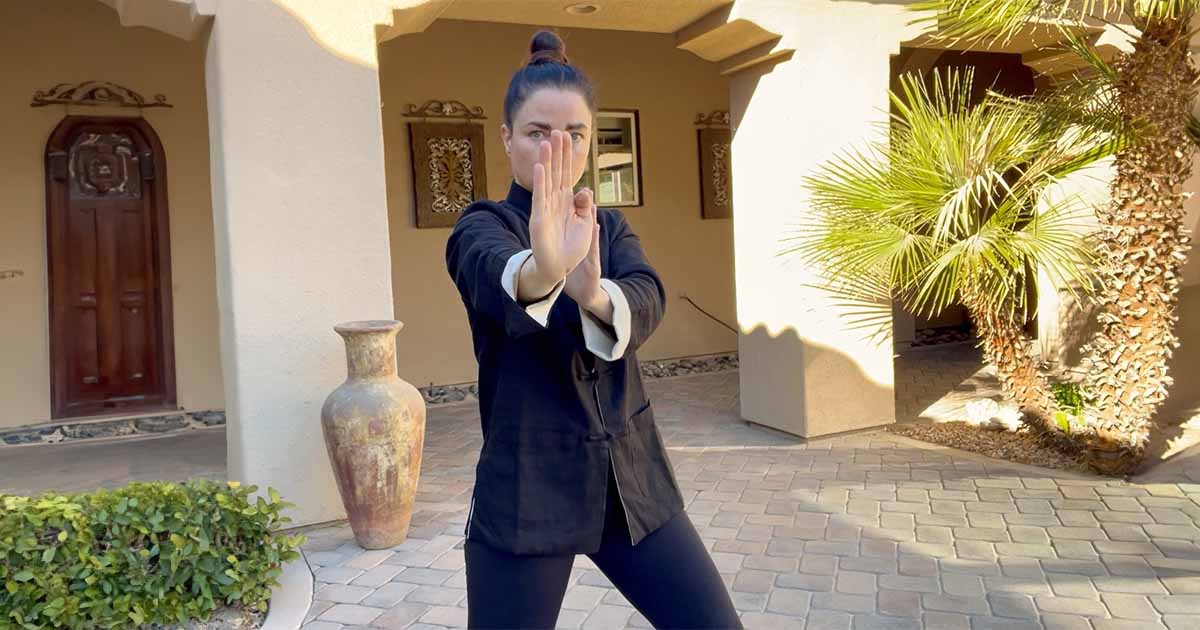 Sifu Kendra Mahon in a Wing Chun stance demonstrating proper structure