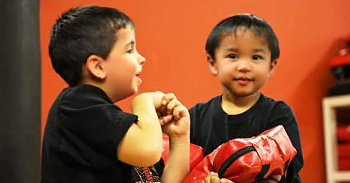 Sifu Kendra Mahon teaching Wing Chun to a young student